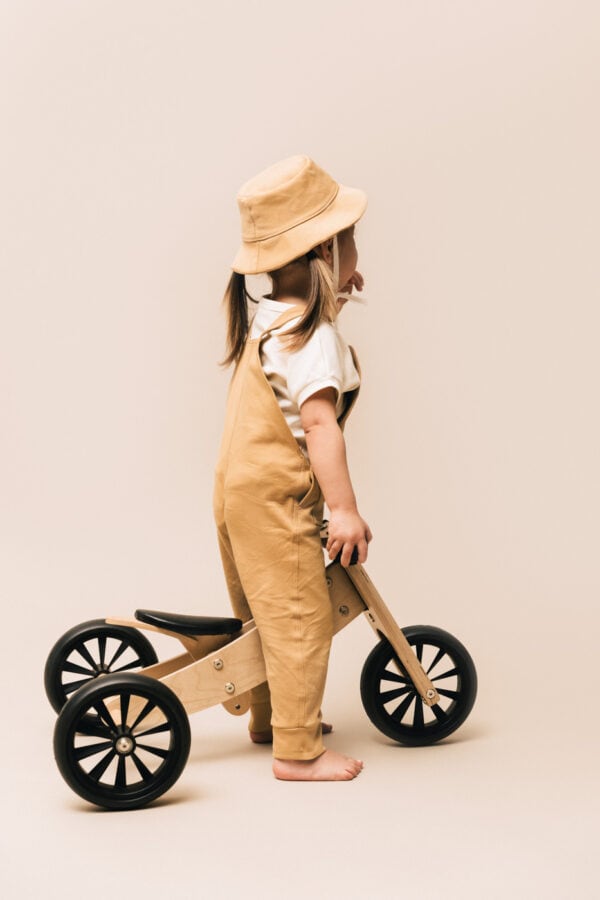 Toddler girl wearing jumpsuit and hat in pima cotton | UAUA Collections