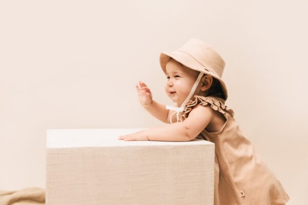 Baby wearing outfit and baby hat in pima cotton | UAUA Collections