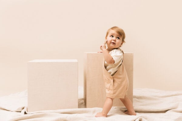 Baby wearing jumpsuit in pima cotton | UAUA Collections