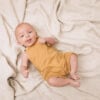 Yellow baby jumpsuit in pima cotton | UAUA Collections
