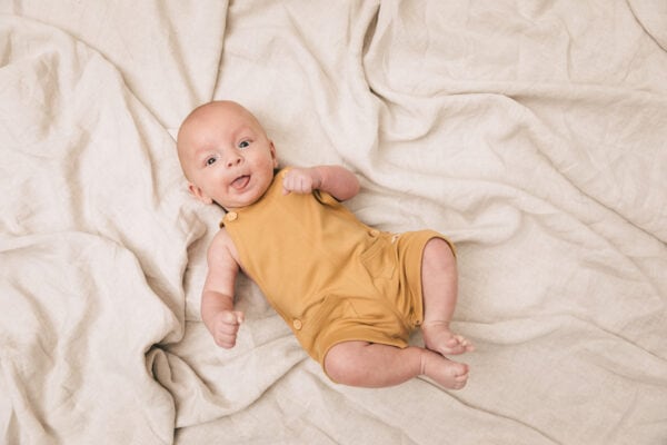 Yellow baby jumpsuit in pima cotton | UAUA Collections