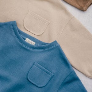 Three baby sweaters in pima cotton | UAUA Collections