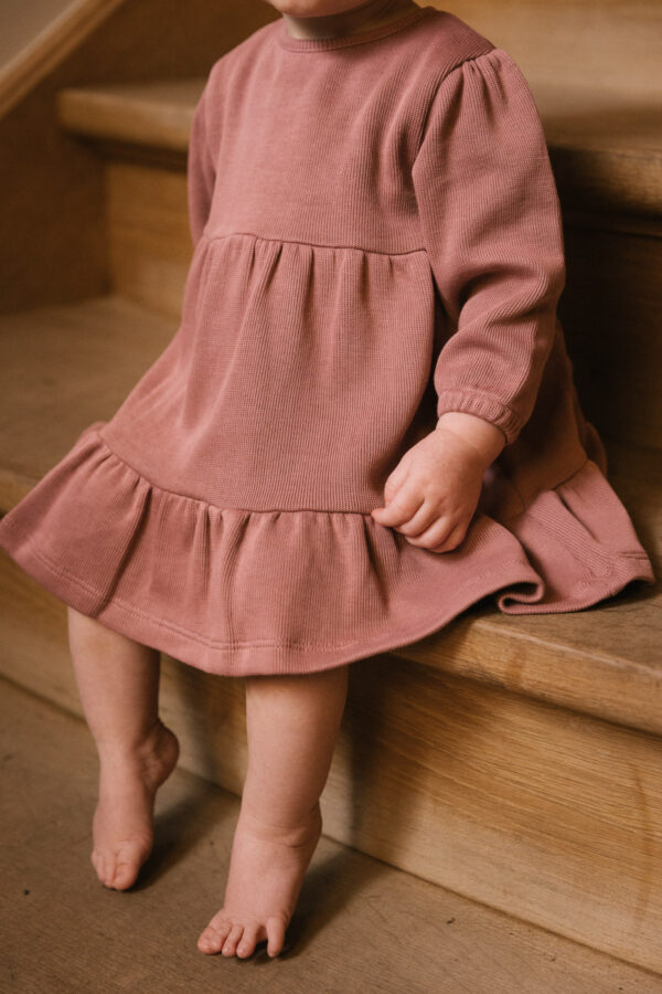 Toddler wearing dress and hair ribbon in pima cotton - hibisco - Puno Collection | UAUA Collections