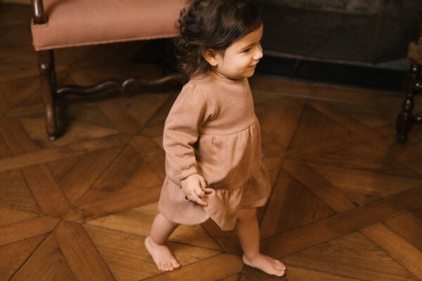 Toddler wearing dress in pima cotton - biscotti - Puno Collection | UAUA Collections
