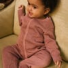 Toddler wearing basic footie in pima cotton - hibisco - Puno Collection | UAUA Collections