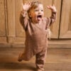 Baby wearing footie in pima cotton - biscotti - Puno Collection | UAUA Collections