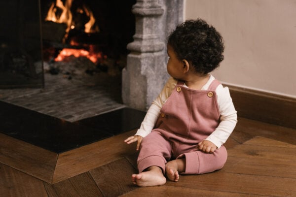 Toddler wearing overall in pima cotton - hibisco- Puno Collection | UAUA Collections