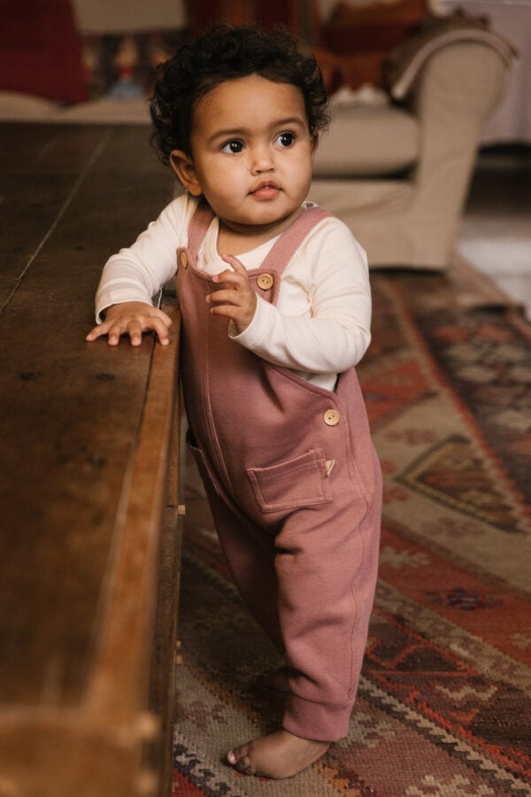 Toddler wearing overall in pima cotton - hibisco- Puno Collection | UAUA Collections