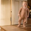 Baby wearing basic footie in pima cotton - biscotti - Puno Collection | UAUA Collections