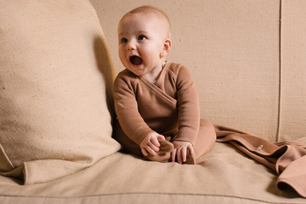 Baby wearing footie in pima cotton - biscotti - Puno Collection | UAUA Collections