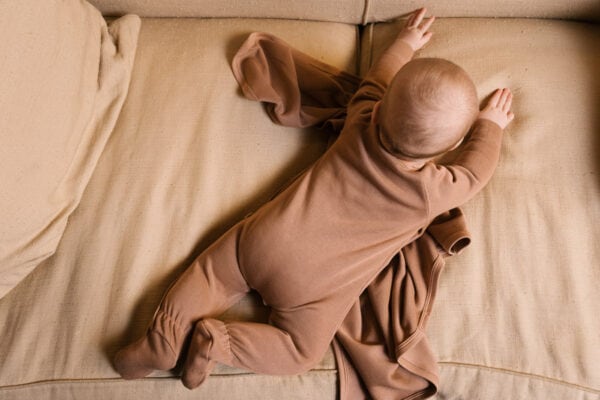 Baby wearing footie in pima cotton - biscotti - Puno Collection | UAUA Collections